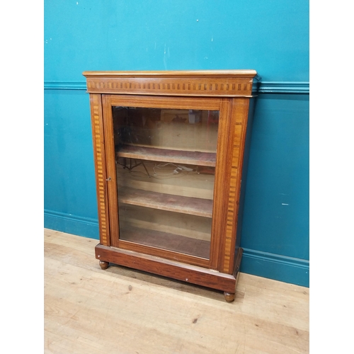 181 - Edwardian rosewood and satinwood inlaid side cabinet with single glazed door raised on bun feet {104... 