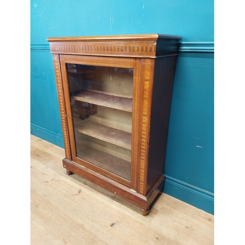 181 - Edwardian rosewood and satinwood inlaid side cabinet with single glazed door raised on bun feet {104... 