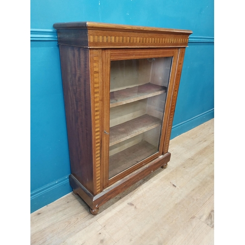 181 - Edwardian rosewood and satinwood inlaid side cabinet with single glazed door raised on bun feet {104... 