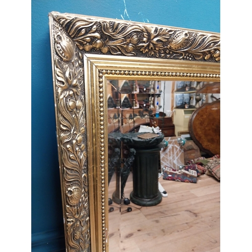 185 - Gilt framed mirror in the Victorian style. { 131cm H X 100cm W }.