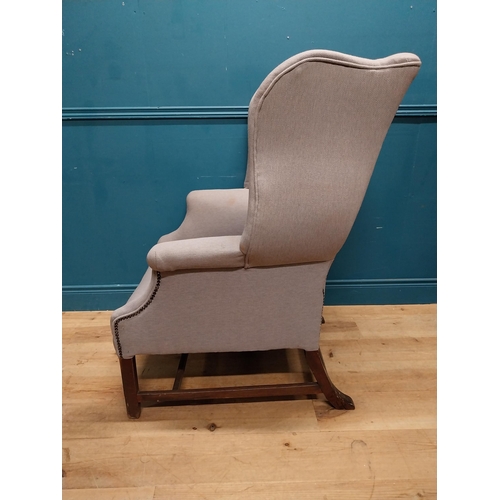 186 - Irish Georgian mahogany and upholstered wing back armchair. {115 cm  x 80 cm W x 85 cm D}.