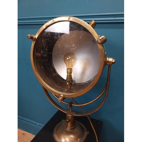 19 - Brass Francis spot light raised on painted pine table {96 cm H x 31 cm W x 31 cm D}.