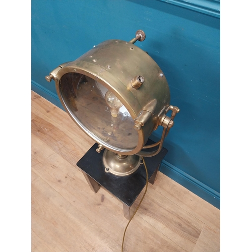 19 - Brass Francis spot light raised on painted pine table {96 cm H x 31 cm W x 31 cm D}.