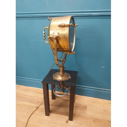 19 - Brass Francis spot light raised on painted pine table {96 cm H x 31 cm W x 31 cm D}.