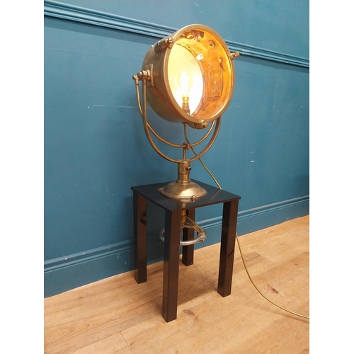 19 - Brass Francis spot light raised on painted pine table {96 cm H x 31 cm W x 31 cm D}.