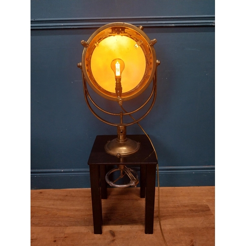 19 - Brass Francis spot light raised on painted pine table {96 cm H x 31 cm W x 31 cm D}.