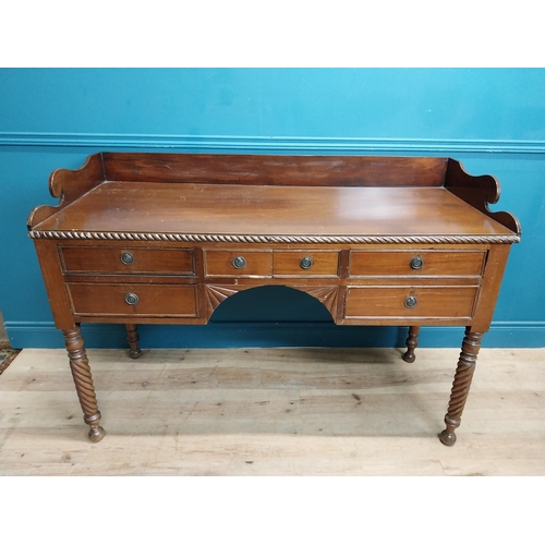 190 - 19th C. mahogany sideboard with gallery back on barley twist legs. {96 cm H x 114 cm W x 59 cm D}.