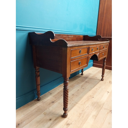 190 - 19th C. mahogany sideboard with gallery back on barley twist legs. {96 cm H x 114 cm W x 59 cm D}.