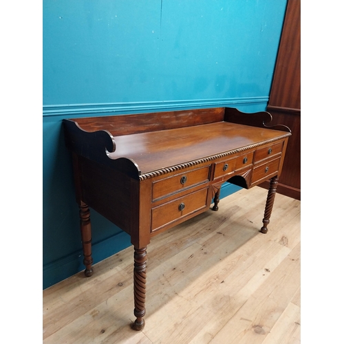 190 - 19th C. mahogany sideboard with gallery back on barley twist legs. {96 cm H x 114 cm W x 59 cm D}.