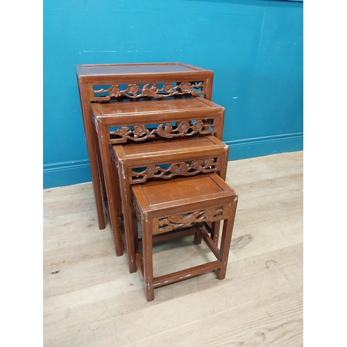 194 - Oriental hardwood nest of four tables {67 cm H x 51 cm W x 36 cm D}.