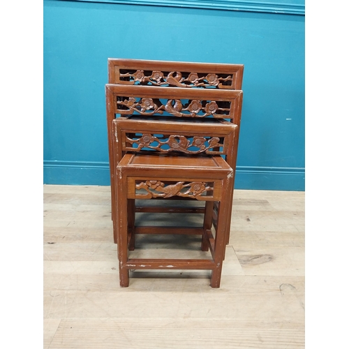 194 - Oriental hardwood nest of four tables {67 cm H x 51 cm W x 36 cm D}.