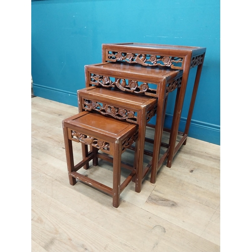 194 - Oriental hardwood nest of four tables {67 cm H x 51 cm W x 36 cm D}.