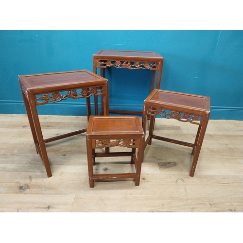 194 - Oriental hardwood nest of four tables {67 cm H x 51 cm W x 36 cm D}.