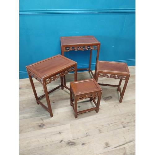 194 - Oriental hardwood nest of four tables {67 cm H x 51 cm W x 36 cm D}.