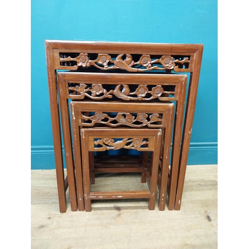 194 - Oriental hardwood nest of four tables {67 cm H x 51 cm W x 36 cm D}.