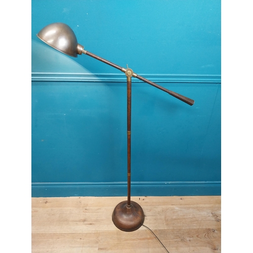 196 - Good quality bronzed metal and leather angle poised floor lamp {130 cm H x 80 cm W x 20 cm D}.