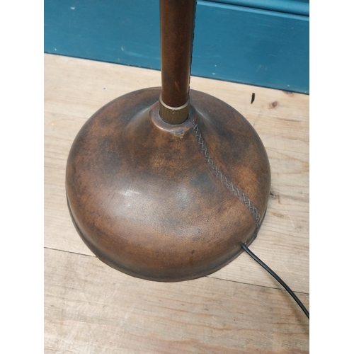 196 - Good quality bronzed metal and leather angle poised floor lamp {130 cm H x 80 cm W x 20 cm D}.