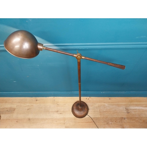 196 - Good quality bronzed metal and leather angle poised floor lamp {130 cm H x 80 cm W x 20 cm D}.