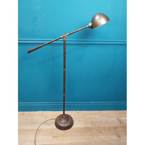 196 - Good quality bronzed metal and leather angle poised floor lamp {130 cm H x 80 cm W x 20 cm D}.