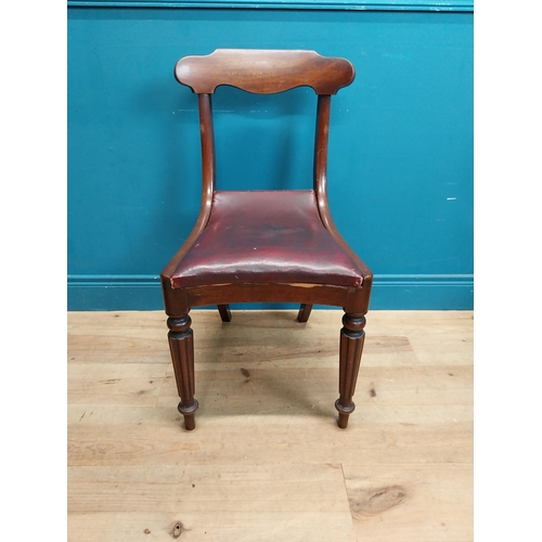 197 - Set of six 19th C. mahogany dining chairs with vinyl upholstered seats raised on reeded legs {86 cm ... 