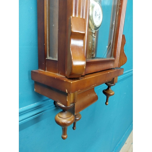 208 - Mahogany Vienna wall clock in the Victorian style with metal and ceramic pendulum. {128 cm H x 41 cm... 