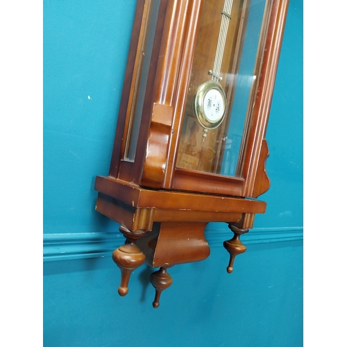 208 - Mahogany Vienna wall clock in the Victorian style with metal and ceramic pendulum. {128 cm H x 41 cm... 