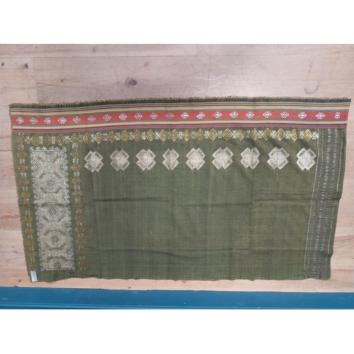 209 - Two decorative woven tribal skirts { 136cm L X 80cm W & 130cm L X 86cm W }.