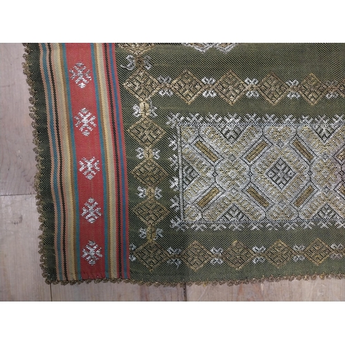 209 - Two decorative woven tribal skirts { 136cm L X 80cm W & 130cm L X 86cm W }.