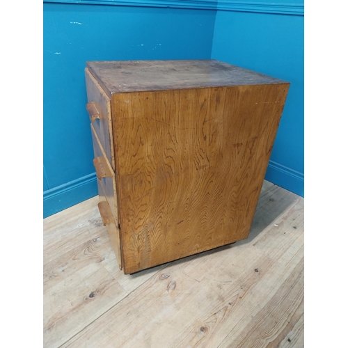 210 - 1950s maple office cabinet with three drawers {78 cm H x 50 cm W x 64 cm D}.