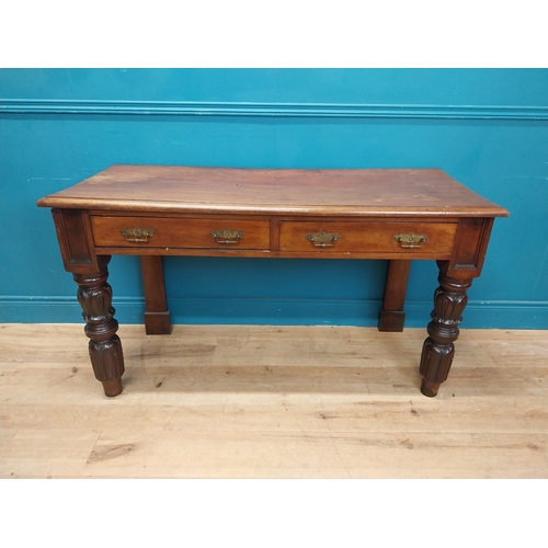 218 - William IV mahogany side table with two drawers in the frieze raised on carved legs {76 cm H x 138 c... 