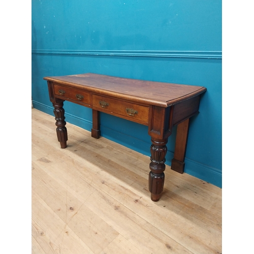 218 - William IV mahogany side table with two drawers in the frieze raised on carved legs {76 cm H x 138 c... 