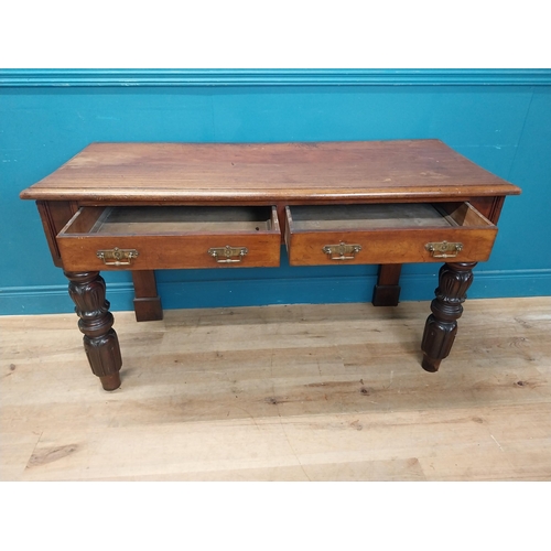 218 - William IV mahogany side table with two drawers in the frieze raised on carved legs {76 cm H x 138 c... 