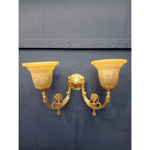 222 - Twin branch brass wall light with amber glass shades. { 30cm HX 47cm W X 20cm D }.