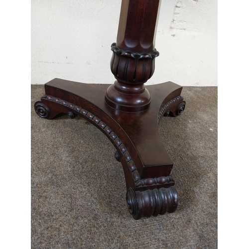 228 - William IV mahogany lamp table raised on turned column, platform base and scroll feet {60 cm H x 50 ... 