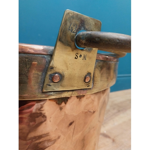 232 - 19th C. copper and brass log bucket with wrought iron handle {53 cm H x 45 cm Dia.}.