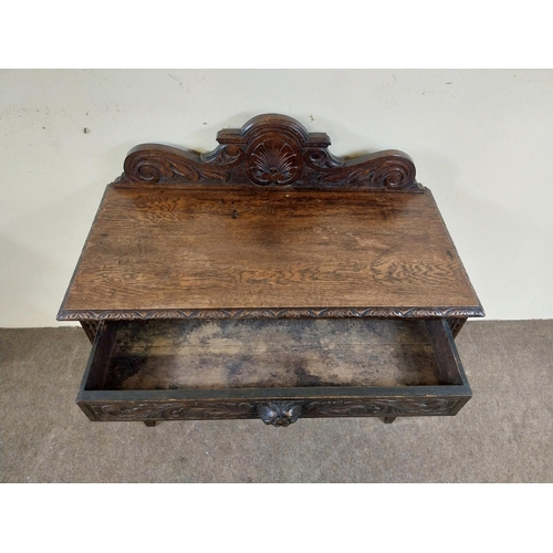 235 - 19th C. oak side table with carved gallery back with carved single drawer in the frieze raised on sq... 