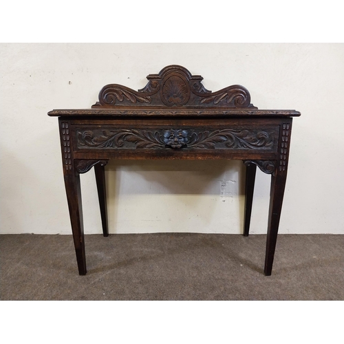 235 - 19th C. oak side table with carved gallery back with carved single drawer in the frieze raised on sq... 