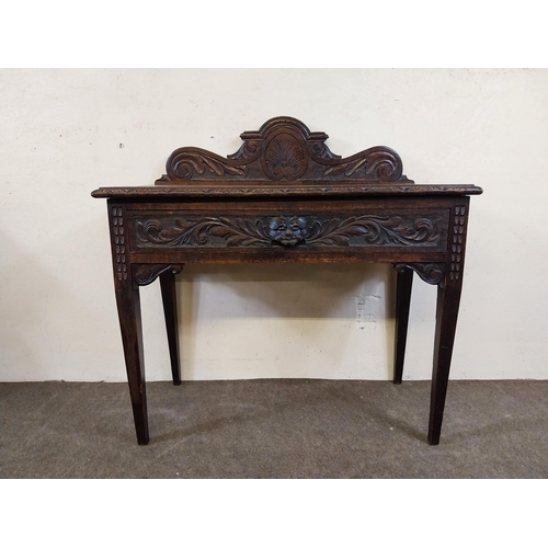 235 - 19th C. oak side table with carved gallery back with carved single drawer in the frieze raised on sq... 