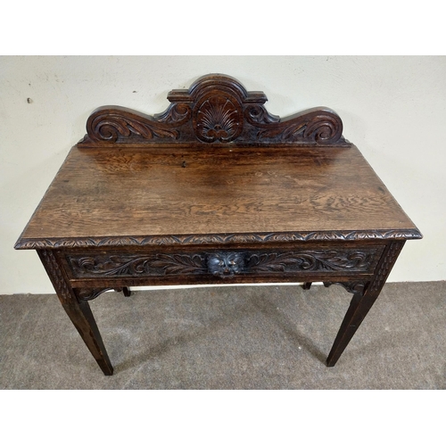 235 - 19th C. oak side table with carved gallery back with carved single drawer in the frieze raised on sq... 