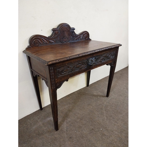 235 - 19th C. oak side table with carved gallery back with carved single drawer in the frieze raised on sq... 