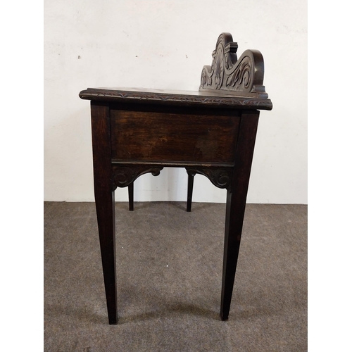 235 - 19th C. oak side table with carved gallery back with carved single drawer in the frieze raised on sq... 