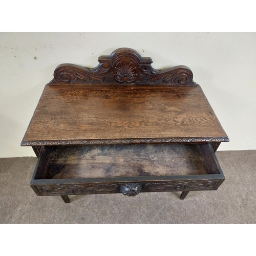 235 - 19th C. oak side table with carved gallery back with carved single drawer in the frieze raised on sq... 