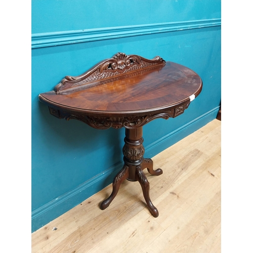 237 - Mahogany demi lune side table on turned column with three outswept feet in the Victorian style. {90 ... 