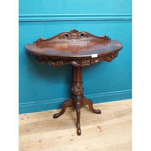 237 - Mahogany demi lune side table on turned column with three outswept feet in the Victorian style. {90 ... 