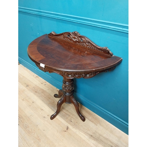 237 - Mahogany demi lune side table on turned column with three outswept feet in the Victorian style. {90 ... 