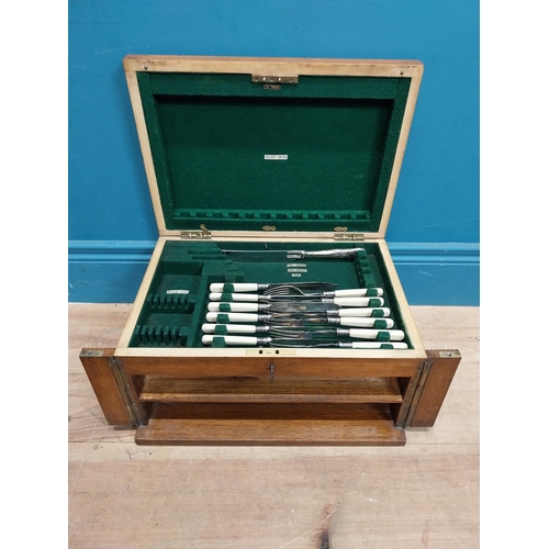 243 - Edwardian oak cased canteen of cutlery {22 cm H x 40 cm W x 29  cm D}.