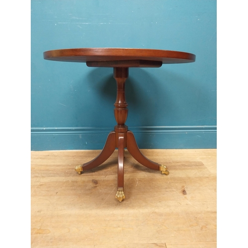 248 - Mahogany table lamp raised on turned column, three outswet legs and lions paw feet {52 cm H x 56 cm ... 