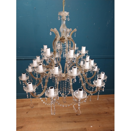 25 - French crystal twenty four branch chandelier. { 100cm H X 98cm Dia }.