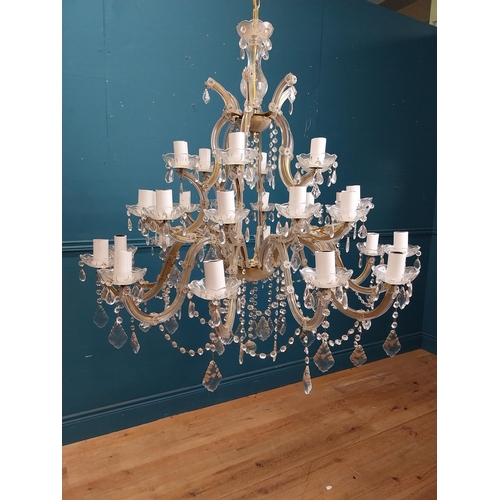 25 - French crystal twenty four branch chandelier. { 100cm H X 98cm Dia }.