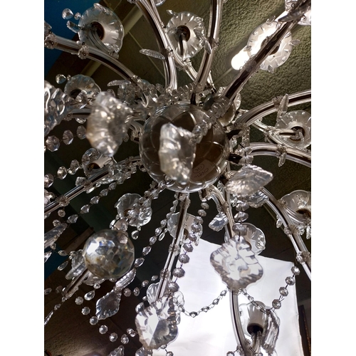 25 - French crystal twenty four branch chandelier. { 100cm H X 98cm Dia }.